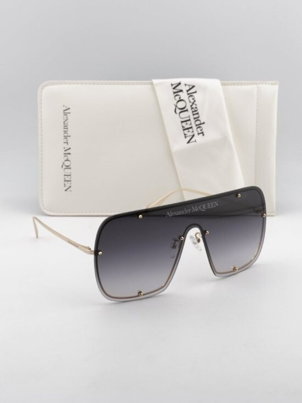 Alexander McQueen AM0362S 003 Shield Rimless Sunglasses - Gold / Grey